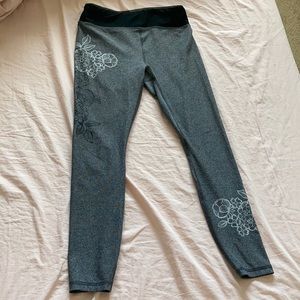 Dark grey leggings with floral print on sides